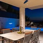 Casa Featuring A Sea View, Billiards, And Heated Pool Villa
